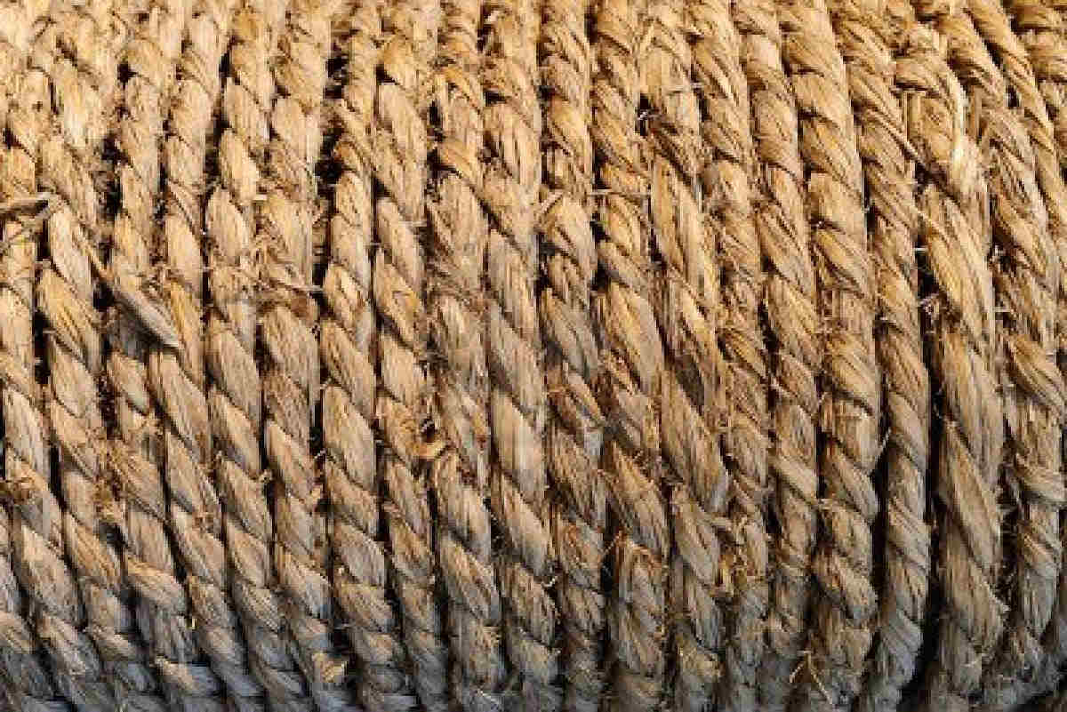 7071249-an-old-manila-rope-wrapped-neatly-and-tightly-around-a-pole.jpg